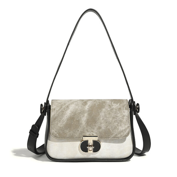 suede clasp saddle handbag